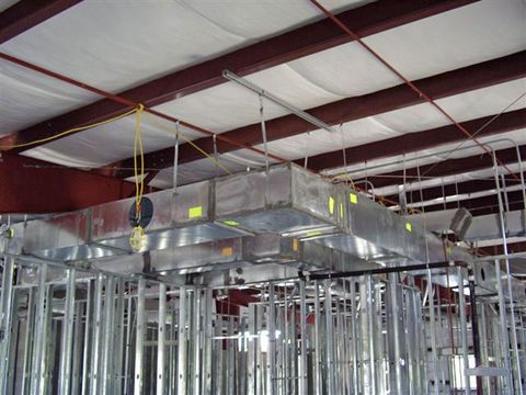 Galvanized commercial ductwork run installed overhead