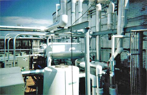 Mechanical piping and valves in a commercial plant room